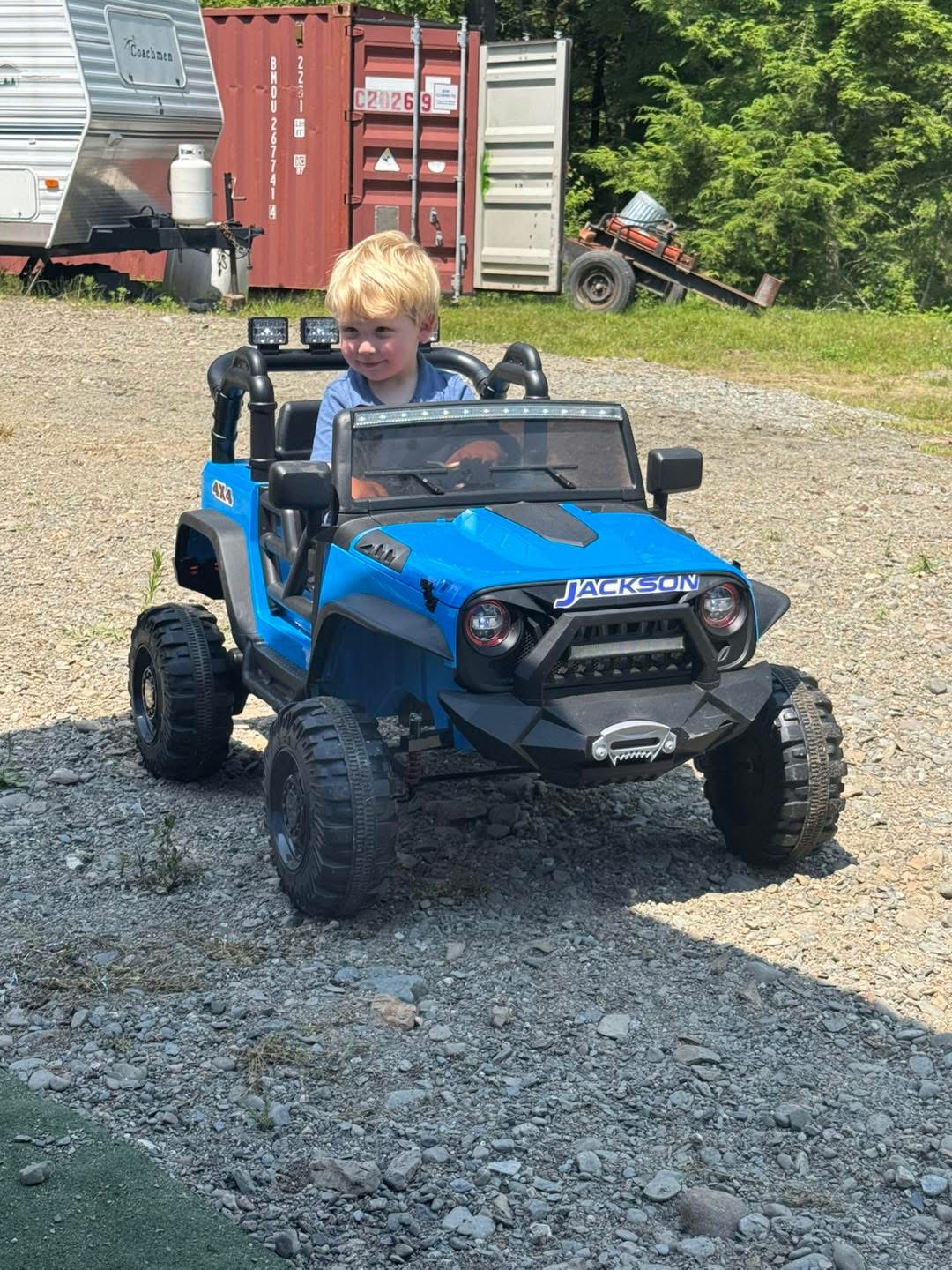 Toddler on battery operated jeep