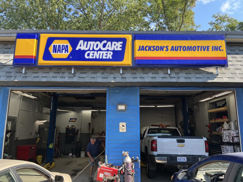 Man sweeping a garage